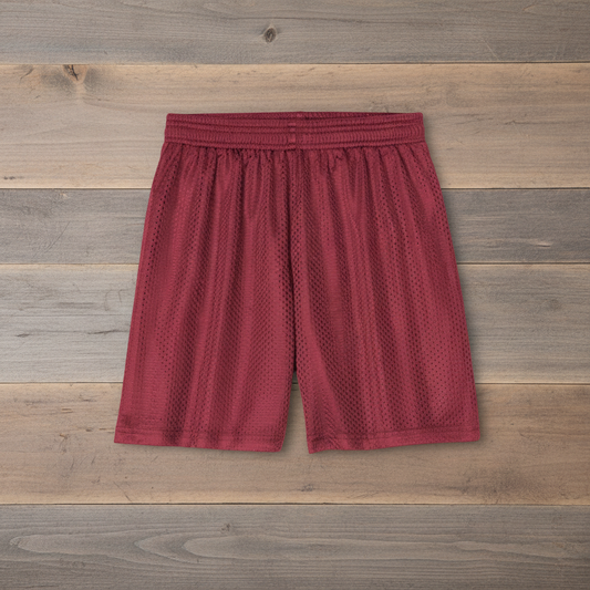 Maroon athletic mesh shorts on wooden background