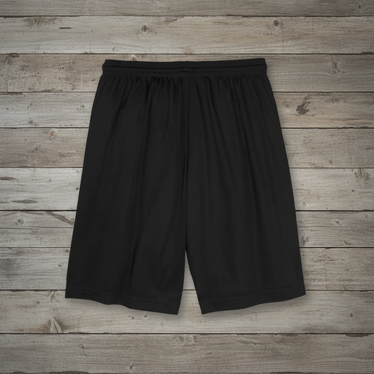 Black athletic shorts on wooden background