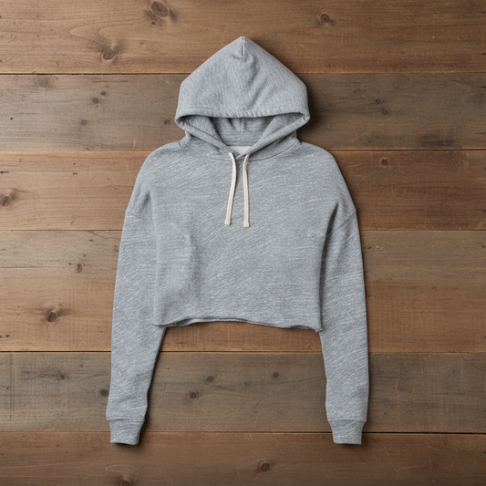 Grey heather crop hoodie on wooden slats - arms down