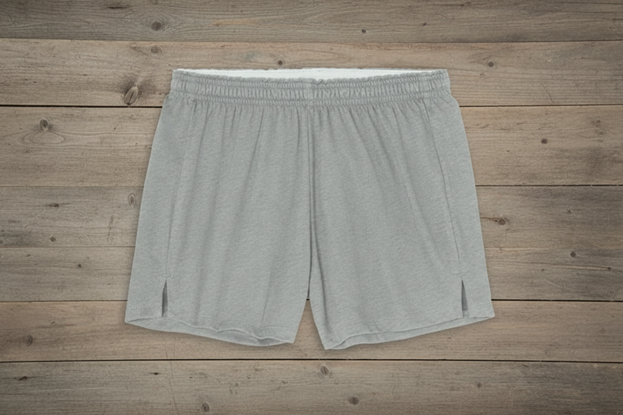 Heather grey athletic shorts on wooden background