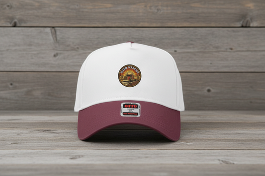 Maroon Fruitdog trucker hat on distressed wood