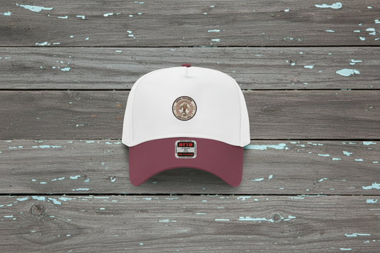 Maroon trucker hat larger on distressed wood