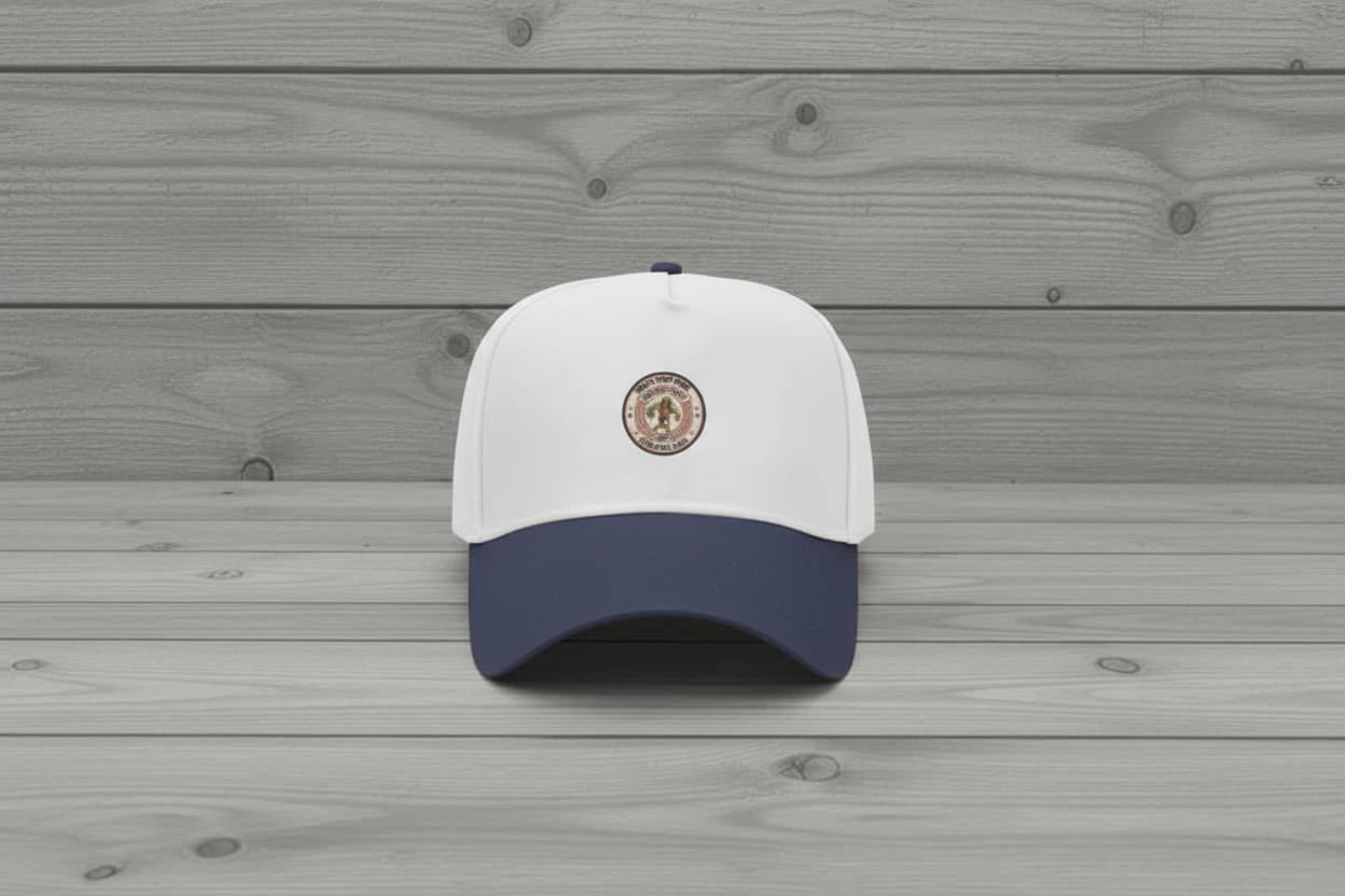 Navy trucker hat on distressed wood